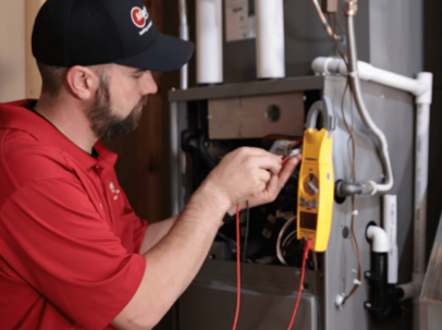technician working on furnace