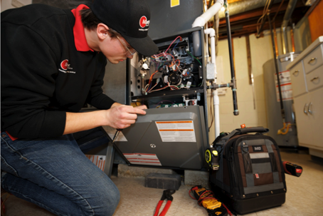 tech working on furnace